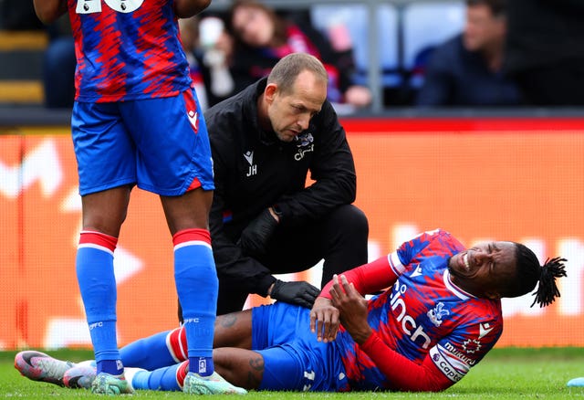 Wilfried Zaha was forced off with a groin strain in the first half against Leicester