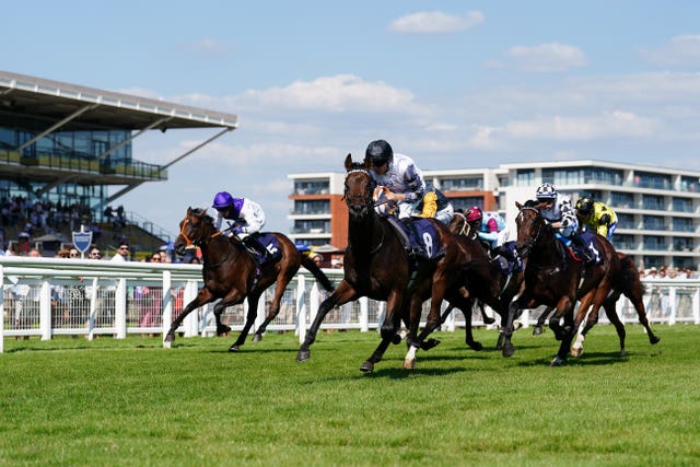 Yah Mo Be There en route to victory in the Rose Bowl Stakes at Newbury