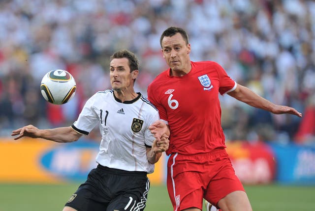 John Terry, right, played 78 times for England (Martin Rickett/PA)