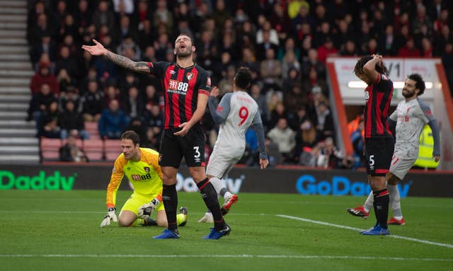 Steve Cook reacts after his own goal