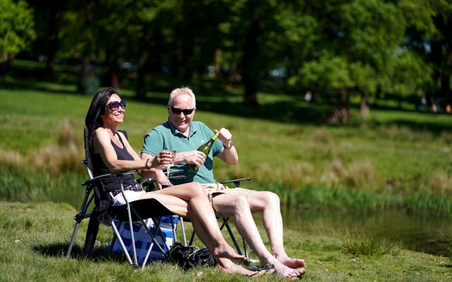 People sitting in the sunshine