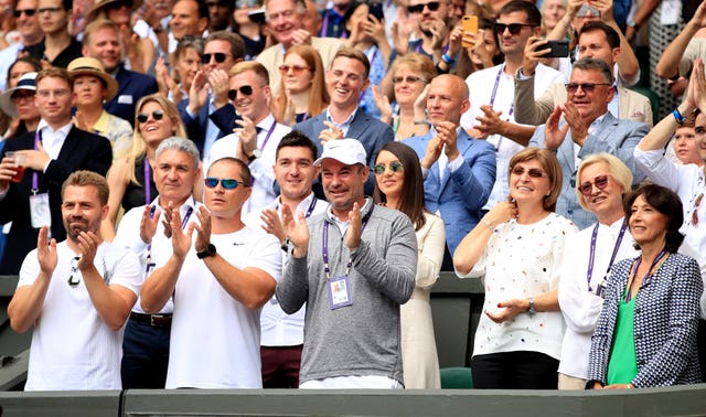 Simona Halep’s family and coaching team celebrate her victory