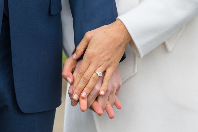 Harry and Meghan, wearing her engagement ring (Dominic Lipinski/PA)