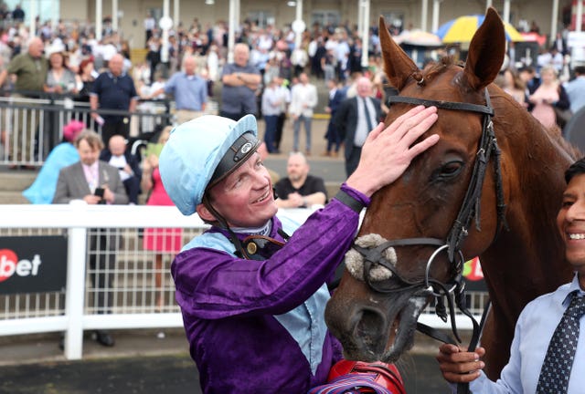 Jockey Rob Hornby with Spirit Mixer after winning the Northumberland Plate