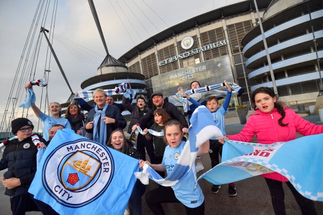 Manchester City fans gathered at the Etihad Stadium to celebrate their title win