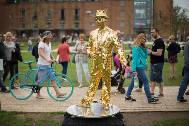 The Gold Mirror Man, from Australia, came a long way for the National Living Statue Competition (Aaron Chown/PA)