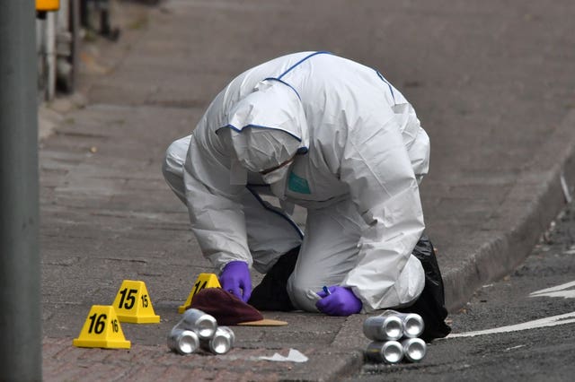 Forensic officers at the scene