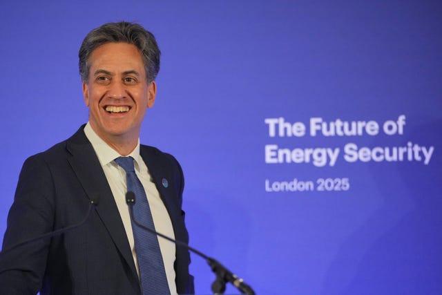 Ed Miliband speaking at a press conference with the words 'The future of energy security' behind him