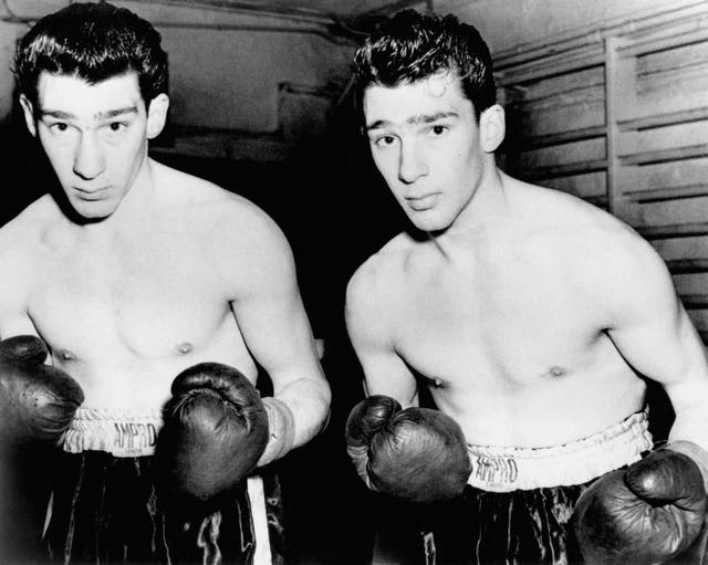 Former amateur boxers, twins Ronnie and Reggie Kray