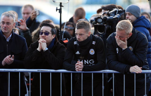 Srivaddhanaprabha, Jamie Vardy and goalkeeper Kasper Schmeichel outside the King Power