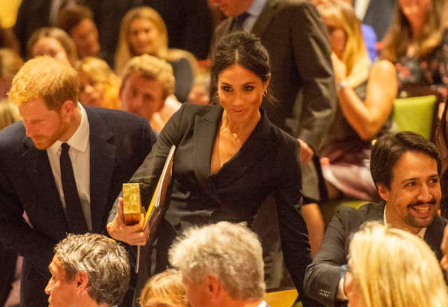 The duke and duchess at the theatre