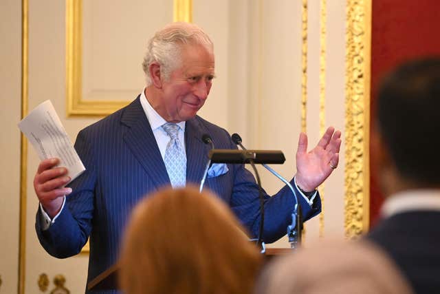 The Prince of Wales praised pharmacy staff for their dedication during the pandemic