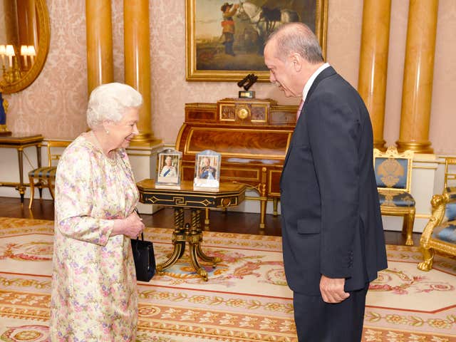 President of Turkey Recep Tayyip Erdogan is greeted by the Queen (John Stillwell/PA)