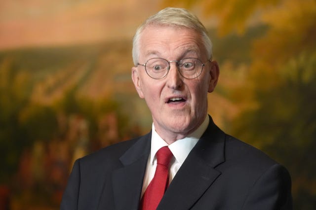 Hilary Benn speaking to the media