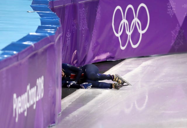 Great Britain’s Elise Christie (left) crashes out in the women's 1500m semi-finals 