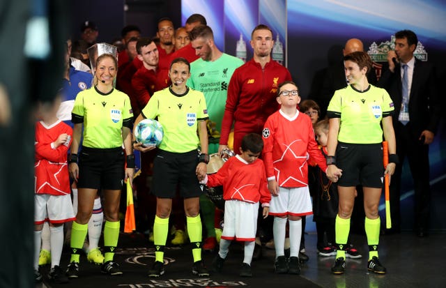 Match Officials Manuela Nicolosi, Stephanie Frappart and Michelle O’Neill lead out the teams