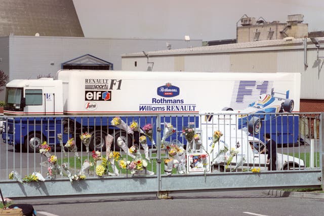 Floral tributes at the gate of the Williams-Renault headquarters at Didcot, Oxfordshire, after the death of Ayrton Senna 