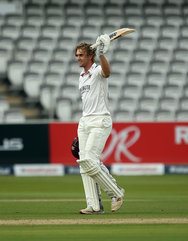 Tom Lammonby celebrates his century at Lord's.