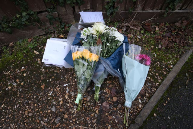 Floral tributes and cards left outside Highdown School in Reading