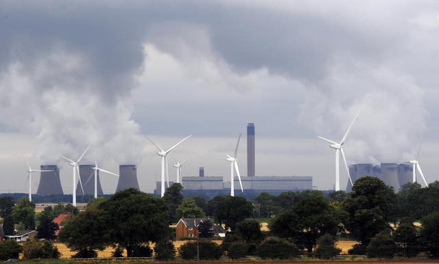 Wind farm next to massive power station