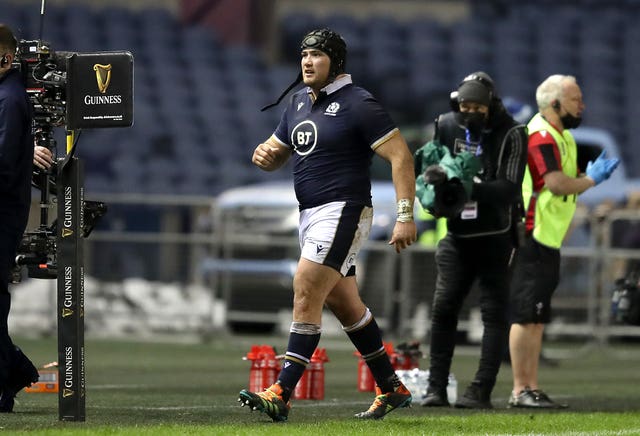 Zander Fagerson leaves the field after being dismissed against Wales