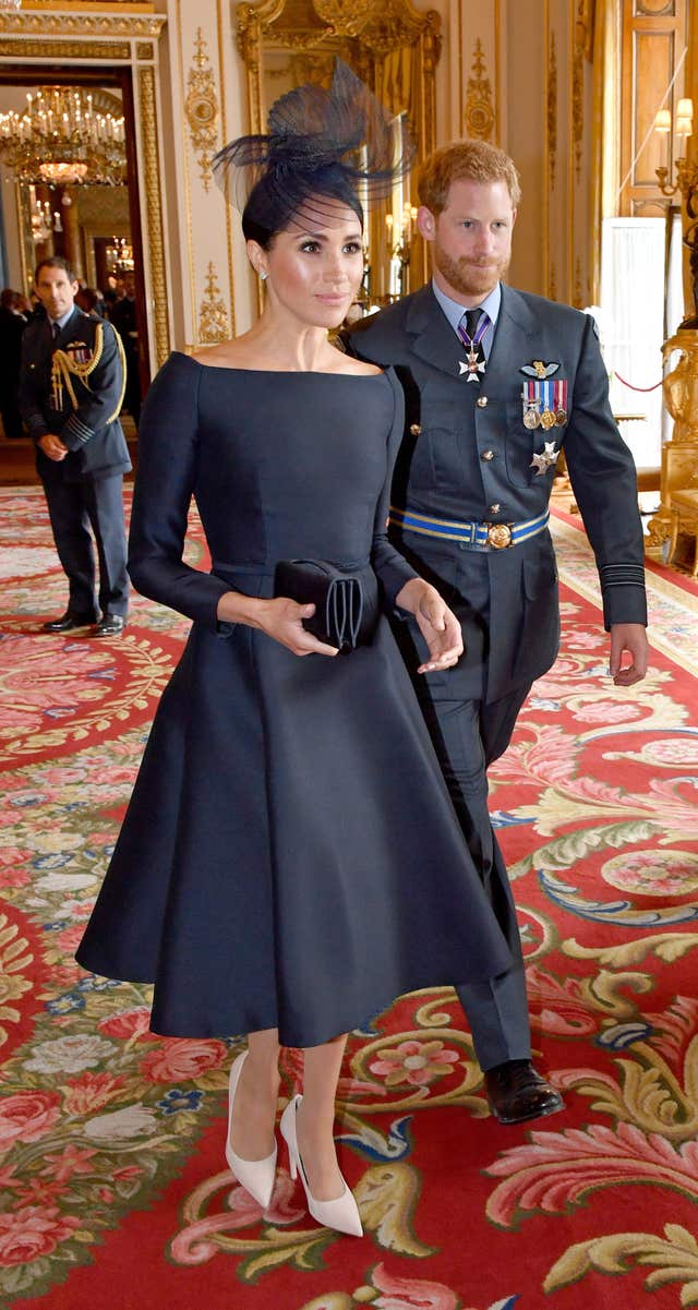 The Duke and Duchess of Sussex attend a reception at Buckingham Palace, London, to mark the centenary of the Royal Air Force.