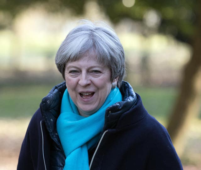 Theresa May attends church
