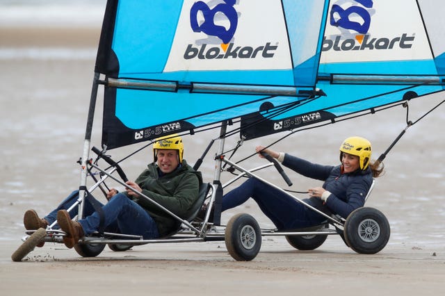 The Duke and Duchess of Cambridge land yachting on the beach at St Andrews