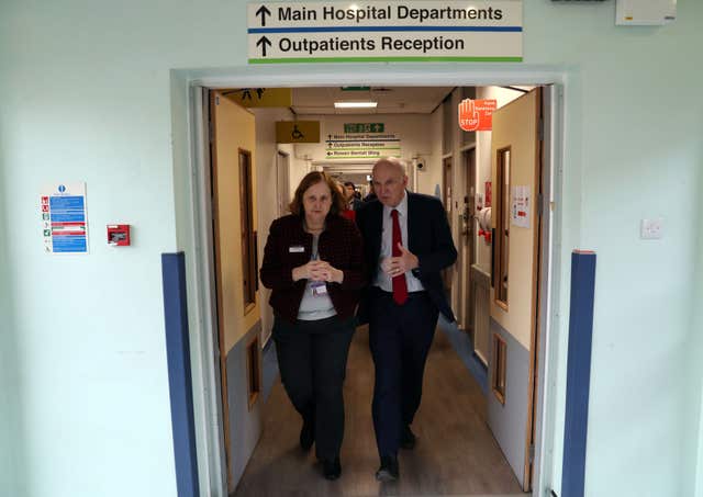 Sir Vince Cable with chief executive of Kingston Hospital Ann Radmore  