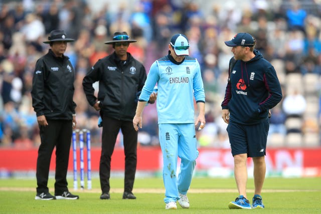 England captain Eoin Morgan leaves the field in pain.