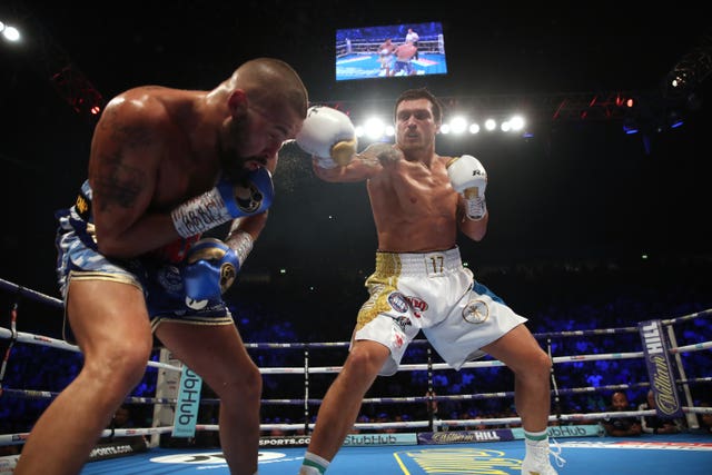 Tony Bellew, left, was beaten in eight rounds by Oleksandr Usyk at Manchester Arena