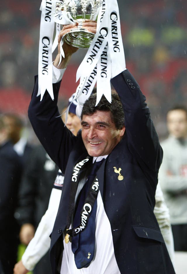 Tottenham Hotspur's manager Juande Ramos celebrates with the Carling Cup
