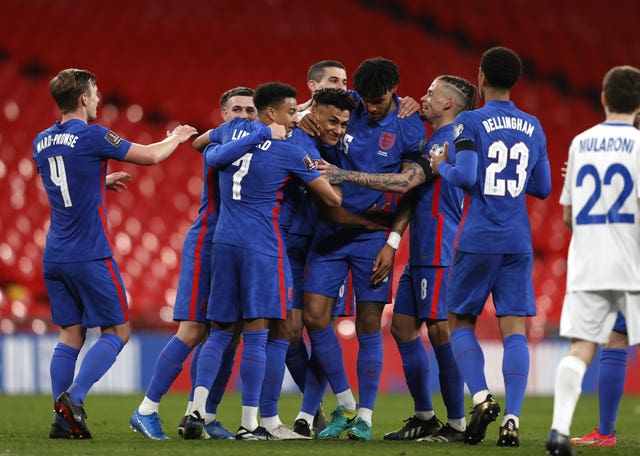 Ollie Watkins (centre) wrapped up the scoring with a debut goal 
