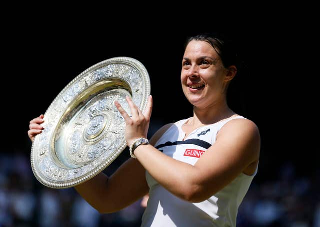 Marion Bartoli celebrates winning the Wimbledon title in 2013