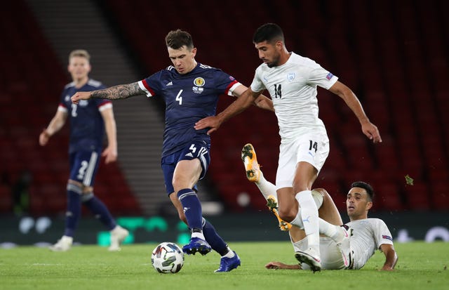 Scotland’s Ryan Jack (left) and Israel’s Yonatan Cohen battle for the ball 