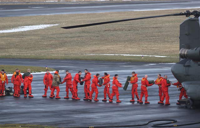 Supplies are loaded at the airport (Owen Humphreys/PA)