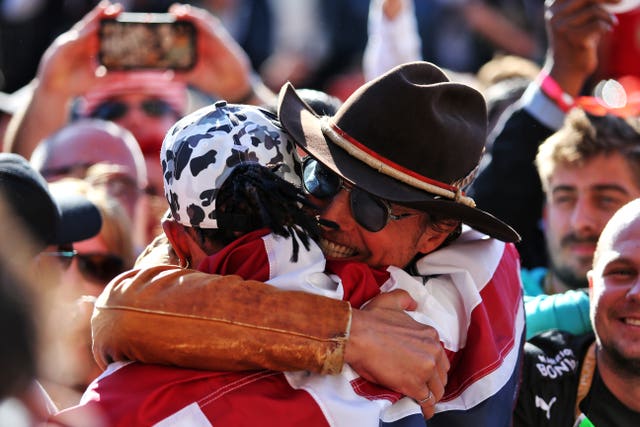 Lewis Hamilton celebrates winning his sixth world championship with actor Matthew McConaughey