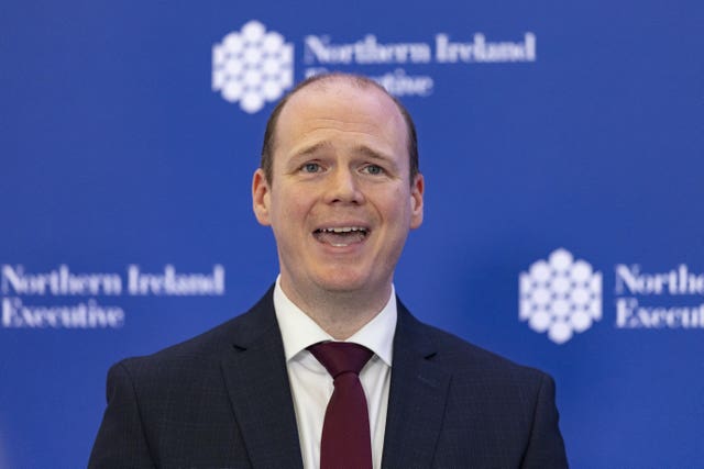 Communities Minister Gordon Lyons speaking during a press conference at Stormont Castle in Belfast