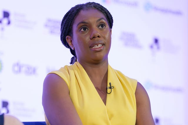 Kemi Badenoch wearing a yellow dress