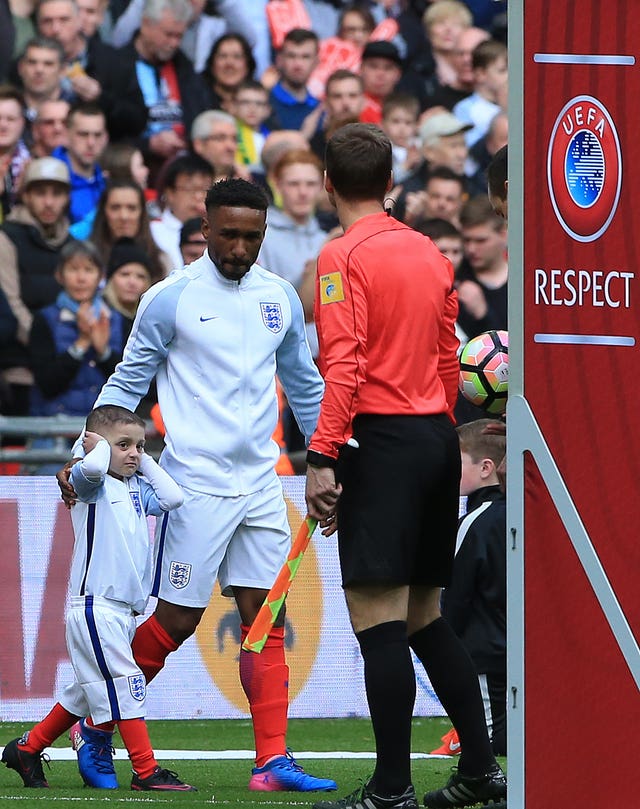 Jermain Defoe led Bradley Lowery out onto the pitch at Wembley (Nick Potts/PA)