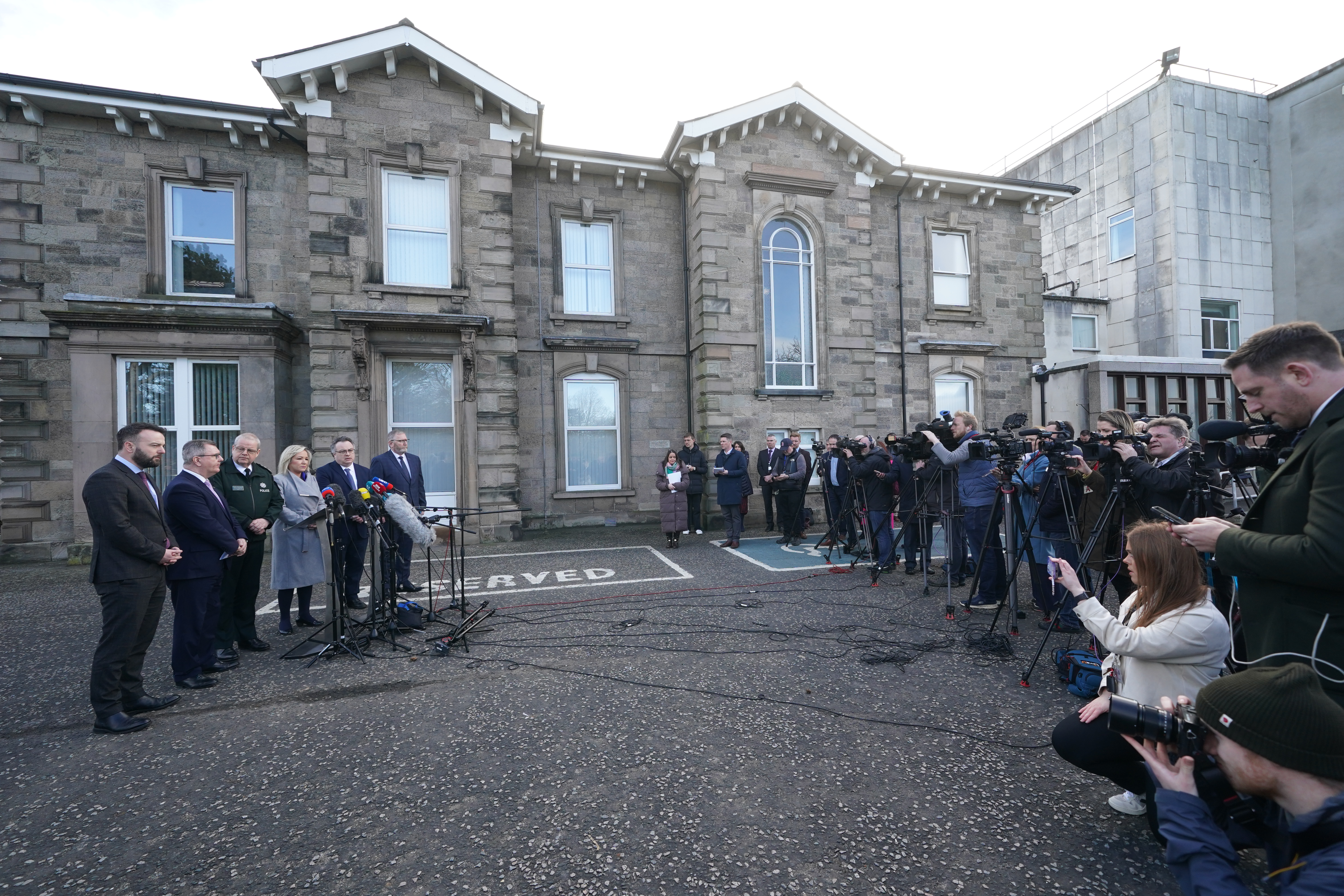 Left to right, SDLP leader Colum Eastwood, DUP leader Sir Jeffrey Donaldson, PSNI Chief Constable Simon Byrne, Sinn Fein's Michelle O’Neill, Stephen Farry from the Alliance party, and Ulster Unionist Party leader Doug Beattie speaking to the media outside the PSNI HQ in Belfast