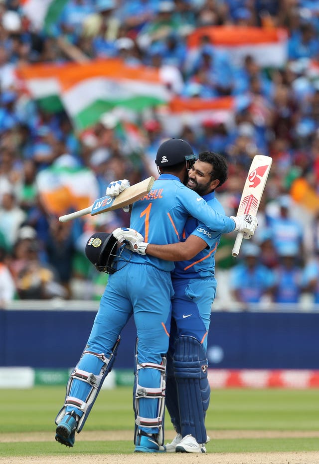 India’s Rohit Sharma celebrates his century with team-mate KL Rahul