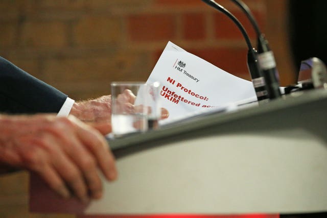 Jeremy Corbyn with document