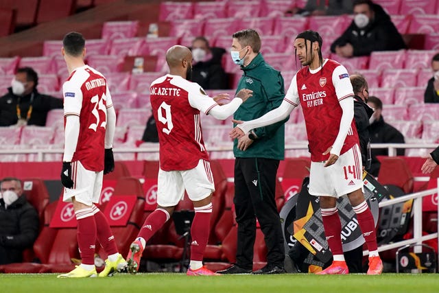 Pierre-Emerick Aubameyang, right, started on the bench