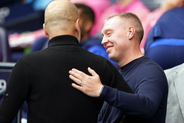 Steve Cooper, right, had mixed feelings after the defeat