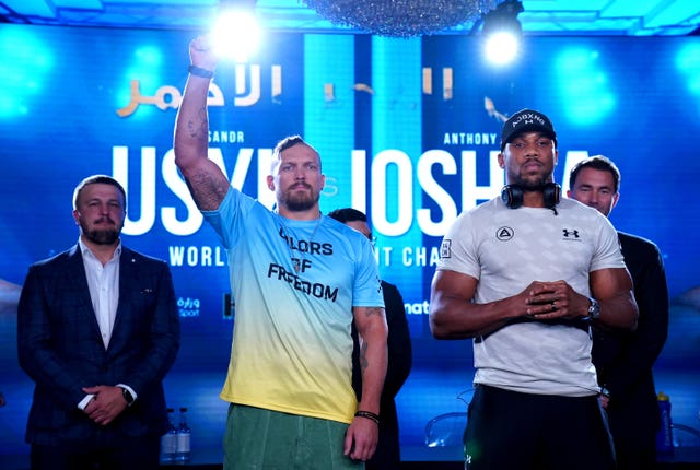 Joshua, right, has won 24 of his 26 professional contests while Usyk is unbeaten (Nick Potts/PA)