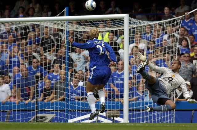 Chelsea's Eidur Gudjohnsen beats Manchester United goalkeeper Tim Howard to score in August 2004 