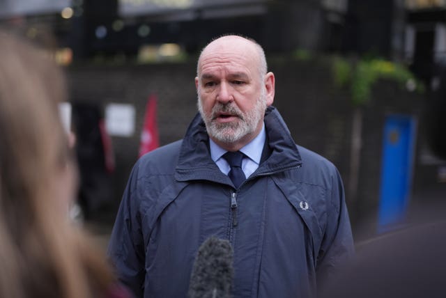 Head and shoulders photo of Mick Whelan speaking into a microphone