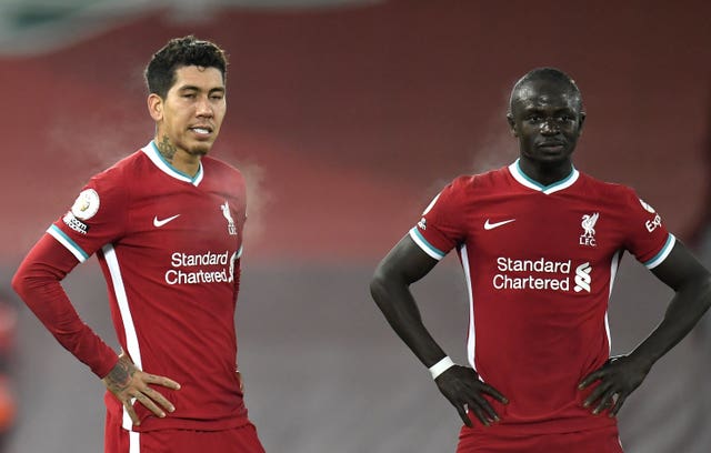 Roberto Firmino and Sadio Mane stand together