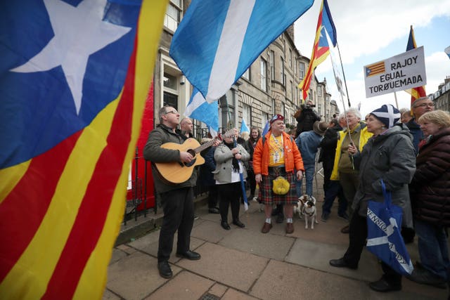 Around 60 people attended the rally (Jane Barlow/PA)